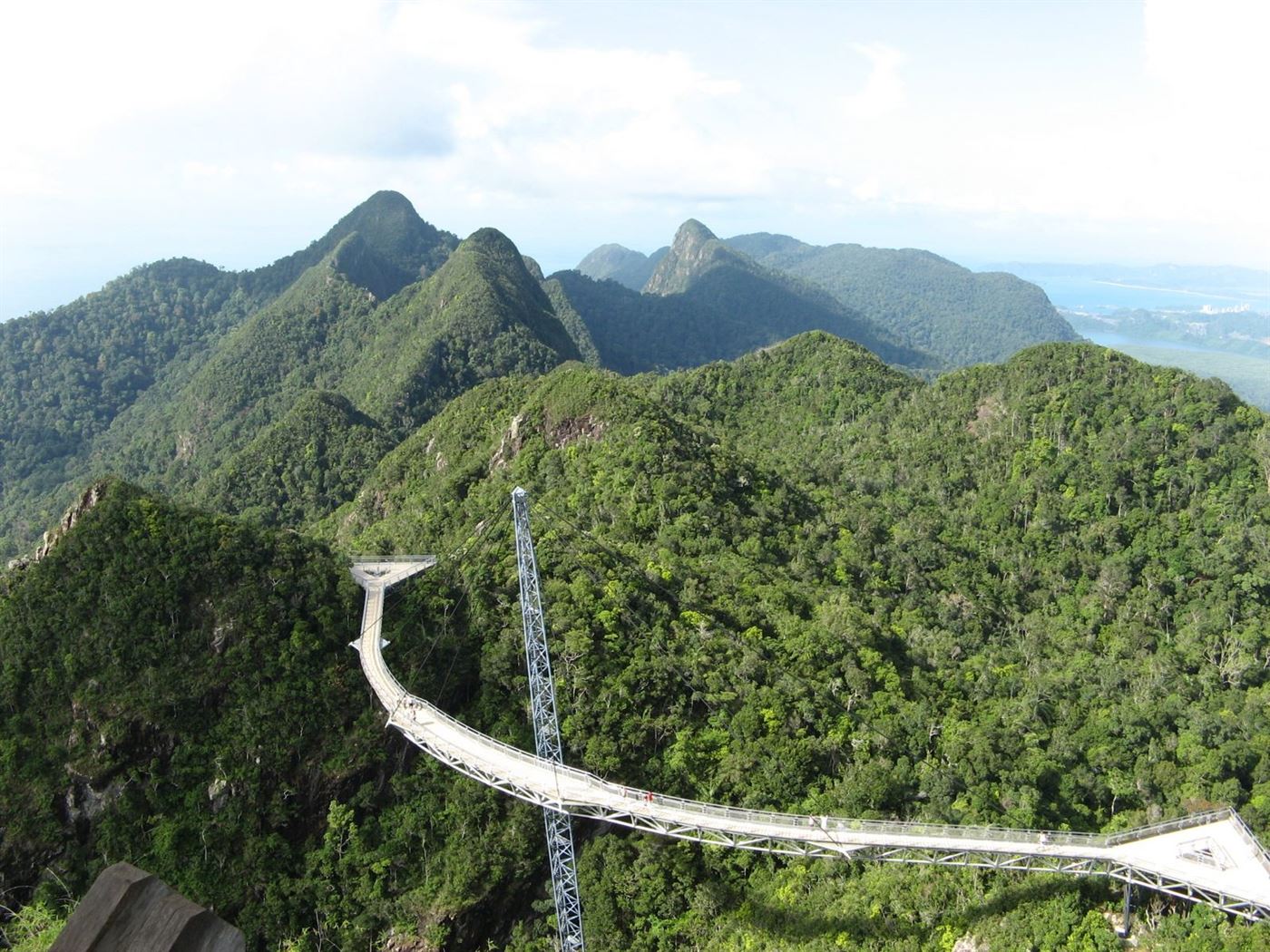 The curved Langkawi Sky Bridge above the rainforest canopy